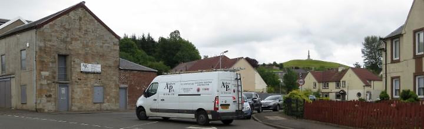 Andrew Park and Sons premises on Commercial Road, Strathaven, with the company van outside